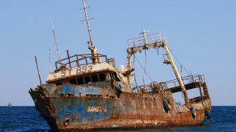 Rusted Out Sahel-L Abandoned in Shallow Water in Noaudhibou - Mauritania