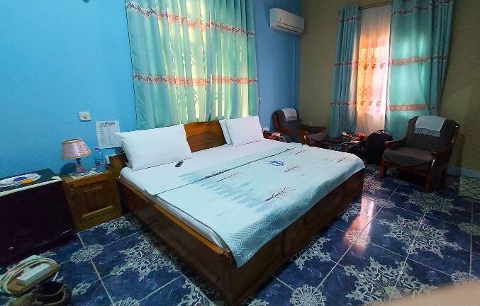 Hotel Room Interior with Blue Walls